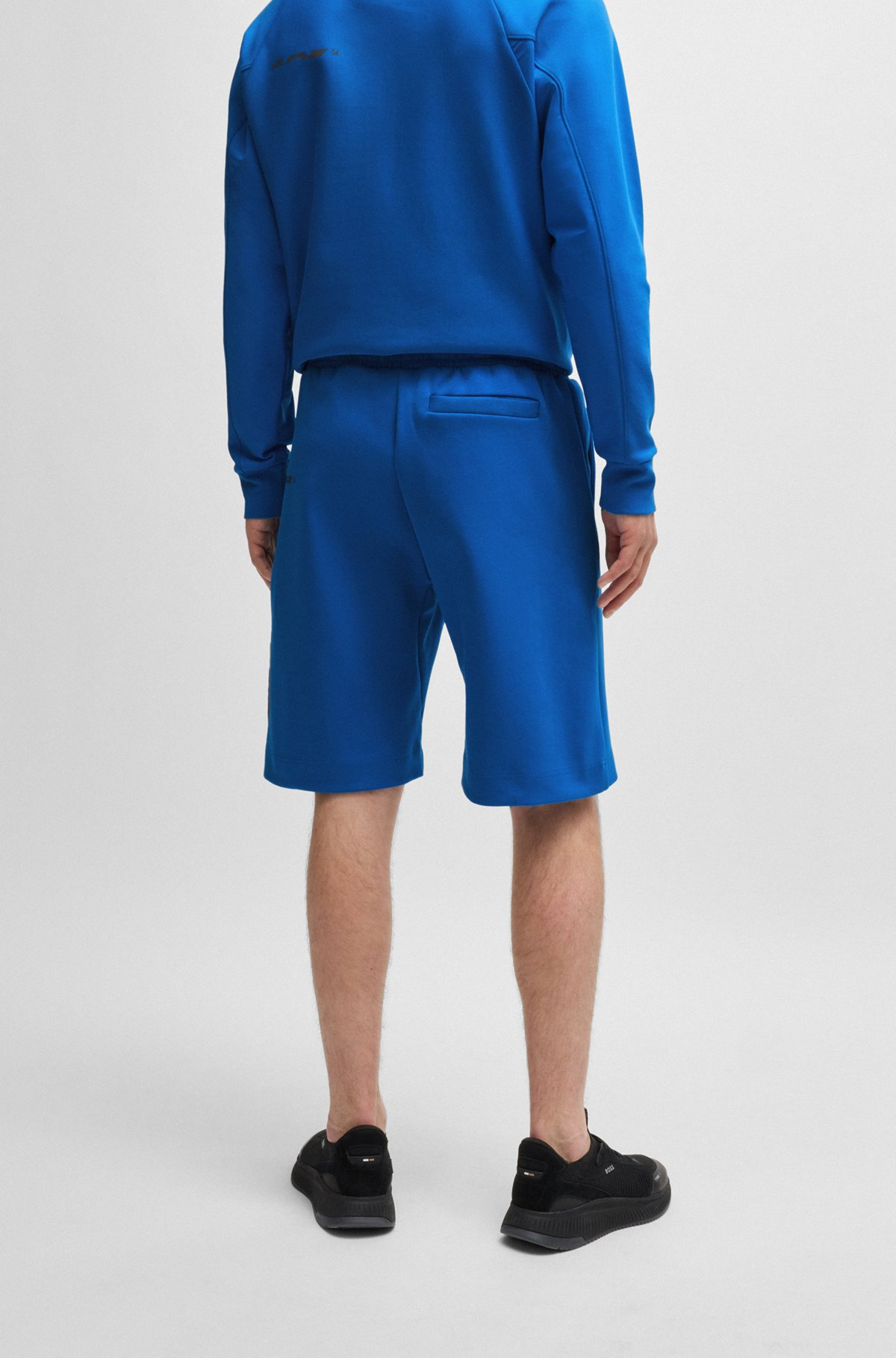 SHORTS WITH DECORATIVE REFLECTIVE LOGO - 5