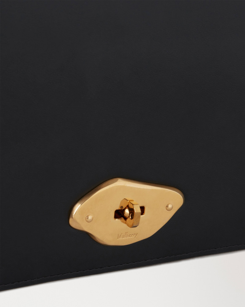 Lana Wallet on Strap
Black High Gloss Leather 6