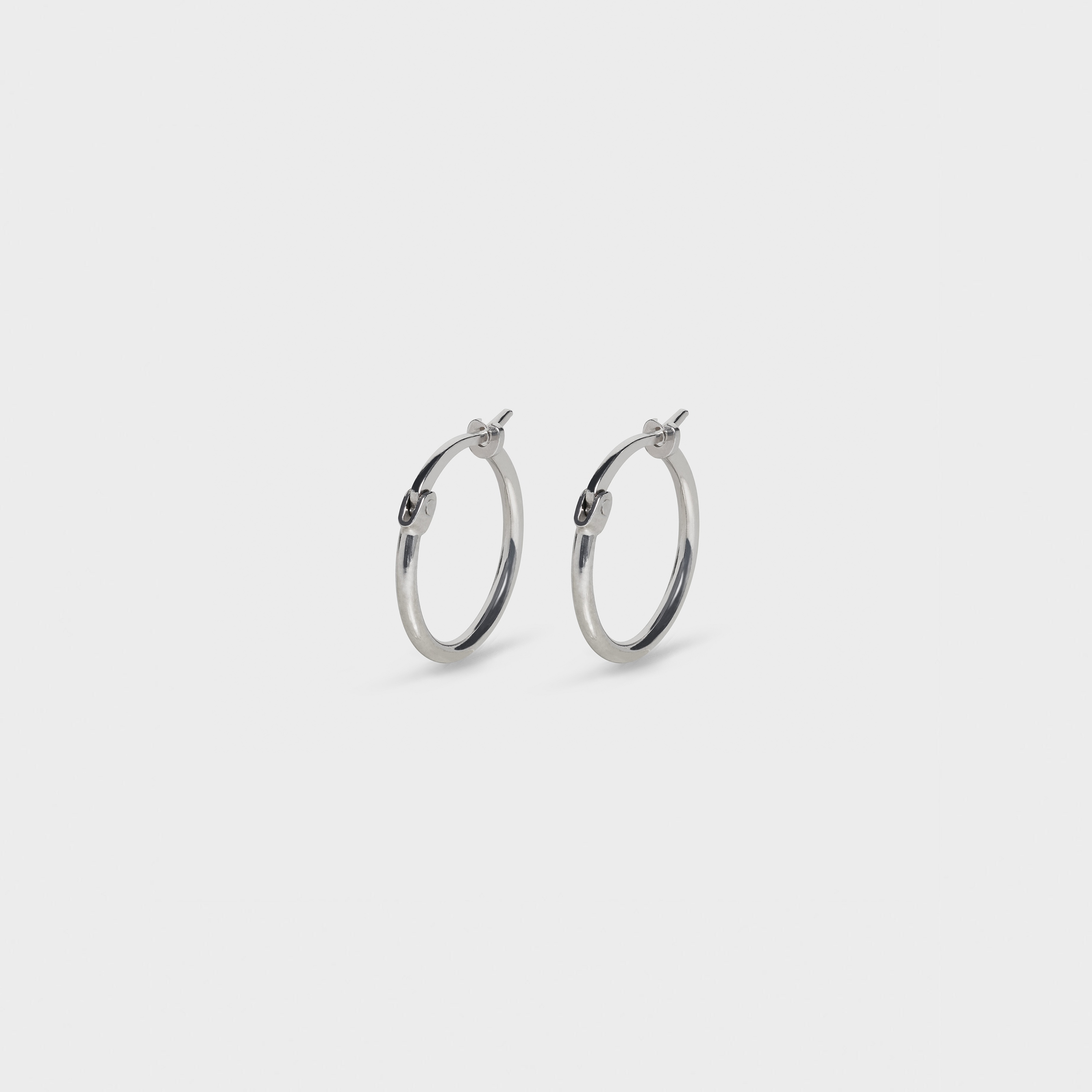 SIMPLE FORMS EXTRA SMALL HOOPS IN BRASS WITH RHODIUM FINISH - 2