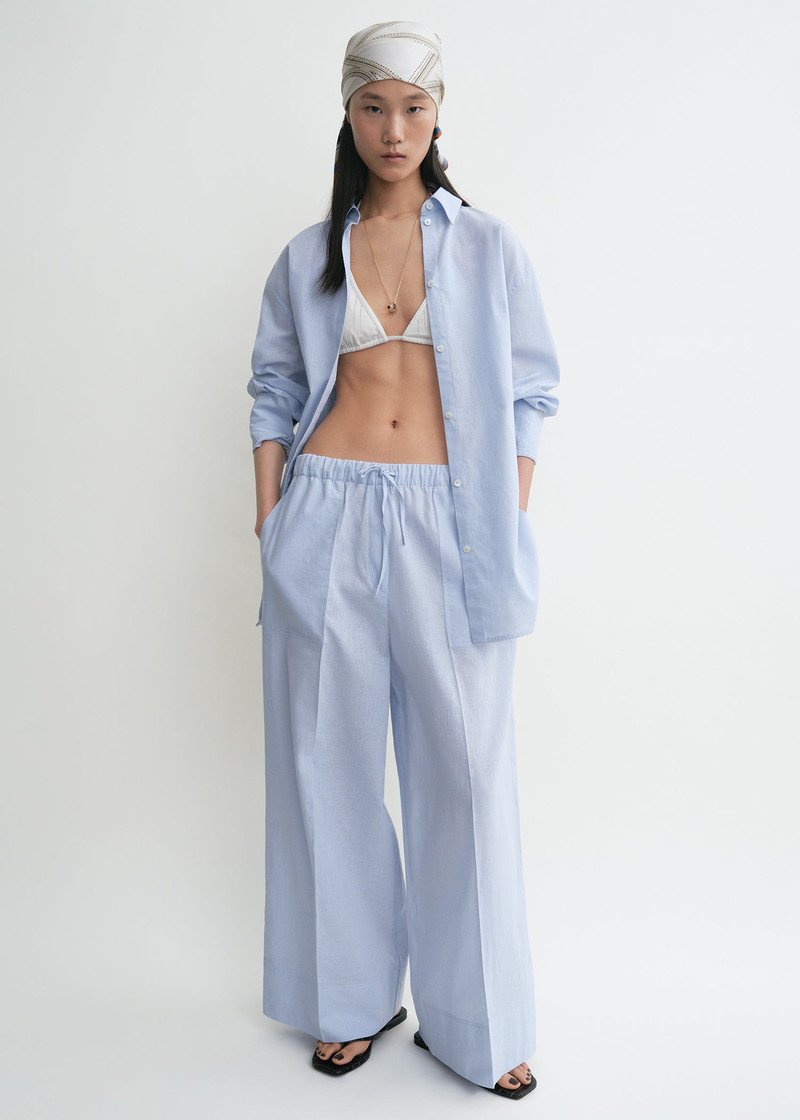 Totême Wide summer trousers sky outlook