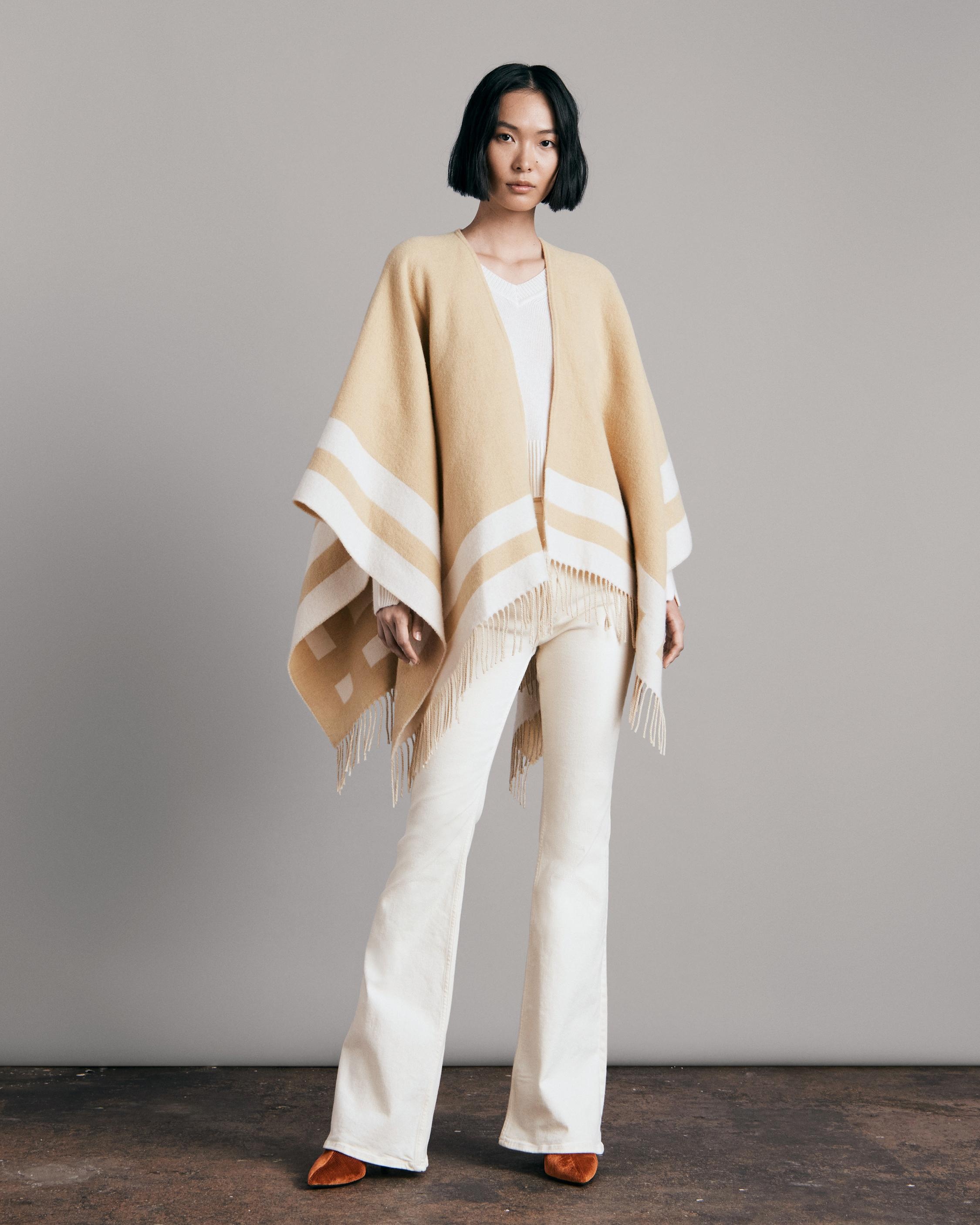 Highlands Wool Reversible Poncho
Midweight Poncho - 1