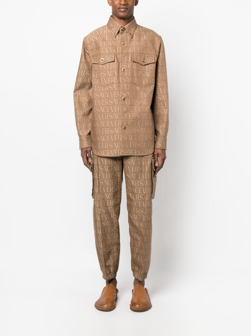VERSACE Allover logo-print cargo trousers outlook