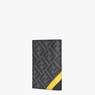 FENDI Passport cover or document holder with interior organized in five card slots. Made of gray textured  outlook