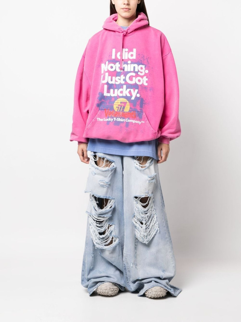 VETEMENTS distressed wide-leg jeans outlook