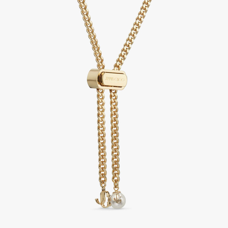 Bon Bon Necklace
Gold-Finish Metal Necklace with Pearl and JC Charm 5