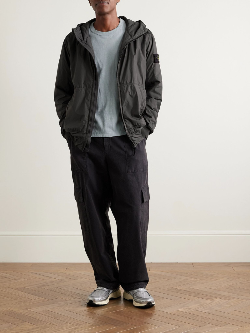 Stone Island Logo-Appliquéd Garment-Dyed Padded Crinkle Reps Nylon Hooded Jacket Dark gray outlook