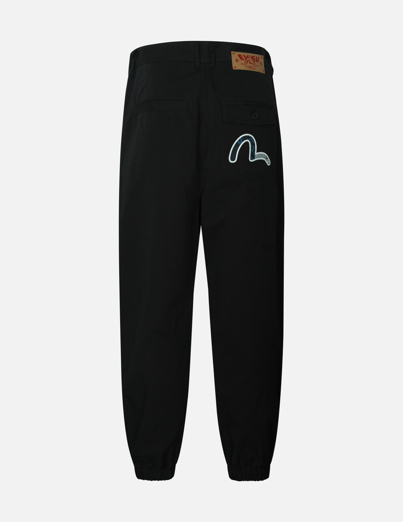 EVISU LOGO AND SEAGULL PATCHWORK APPLIQUÉ LOOSE FIT JOGGERS outlook