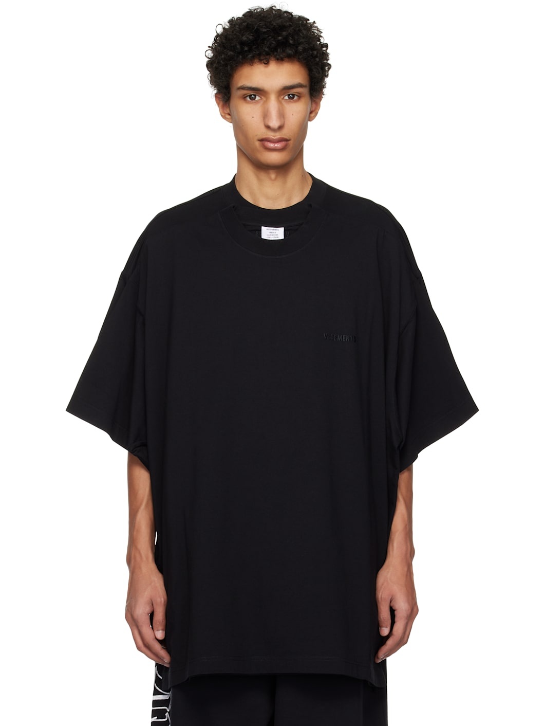 VETEMENTS Black Merged Double Oversized T-shirt | REVERSIBLE