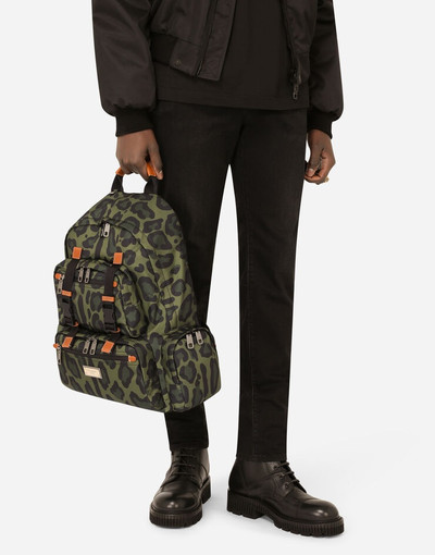 Dolce & Gabbana Nylon backpack with leopard print against a green background and branded plate outlook