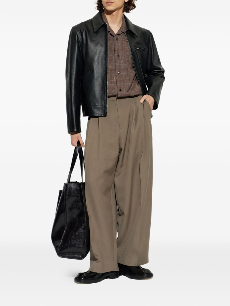 Studio Nicholson pleated trousers outlook