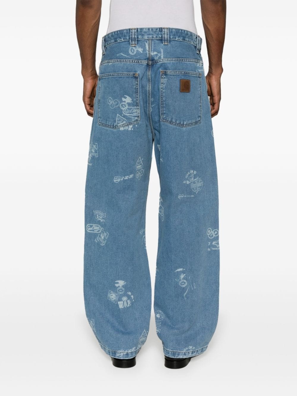 Stamp graphic-print tapered jeans - 4