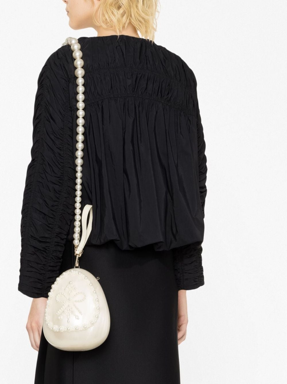 Micro Egg pearl-embellished clutch in white - Simone Rocha