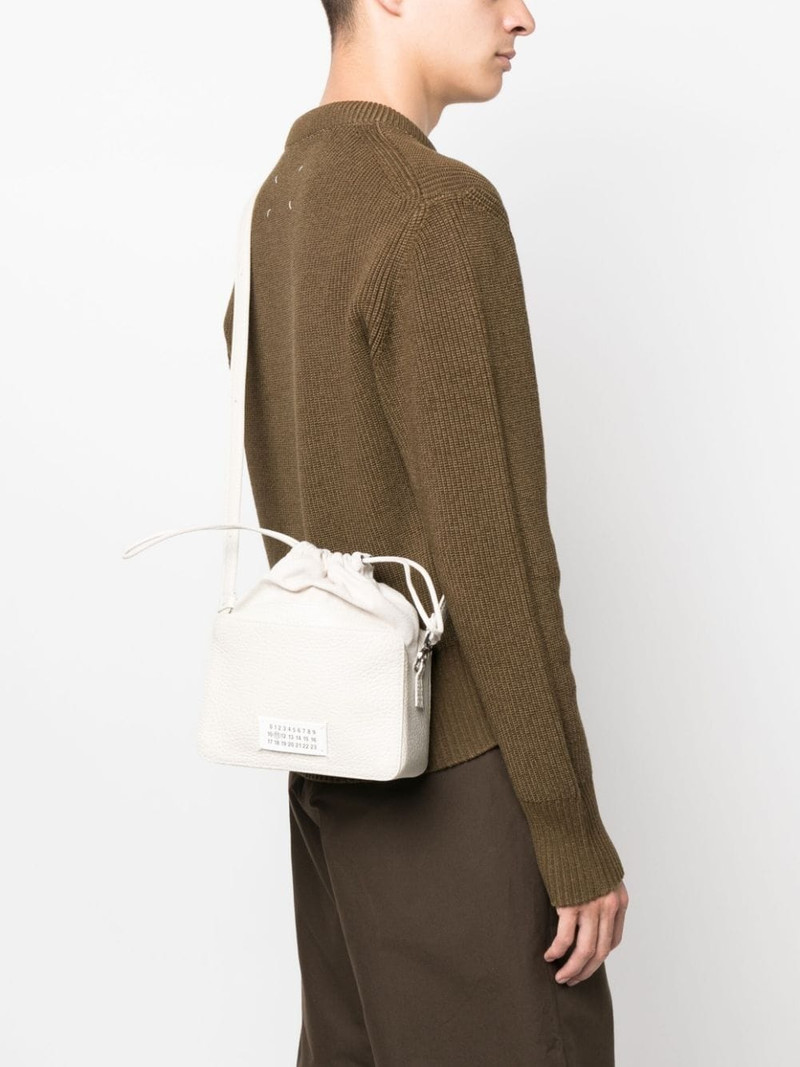 Maison Margiela logo-patch leather bucket bag outlook