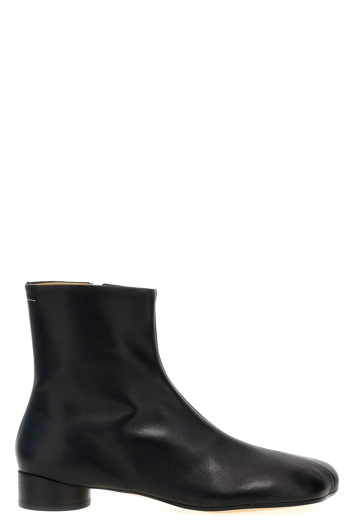 Ankle boots with shaped toe - 1