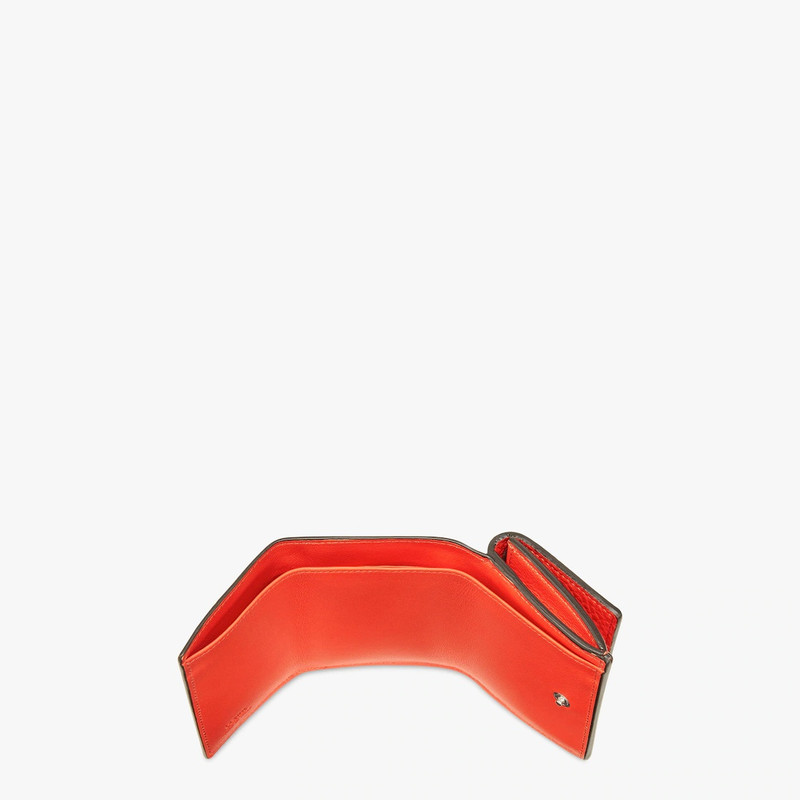 Compact, tri-fold Peekaboo wallet with large internal bill compartment and three concealed card hold 4