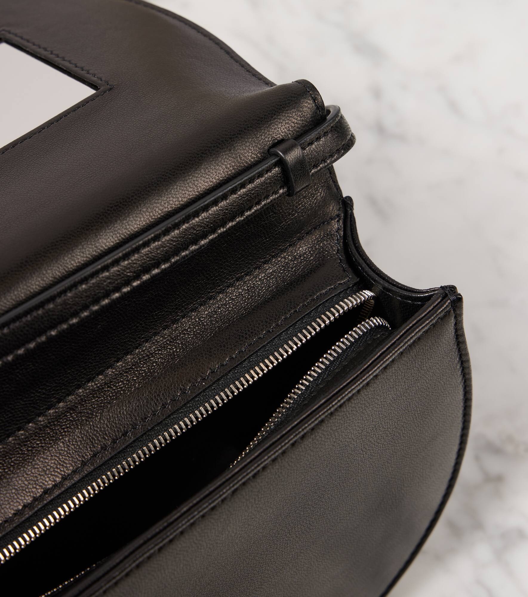 The Row Canteen leather crossbody bag | mytheresa | REVERSIBLE