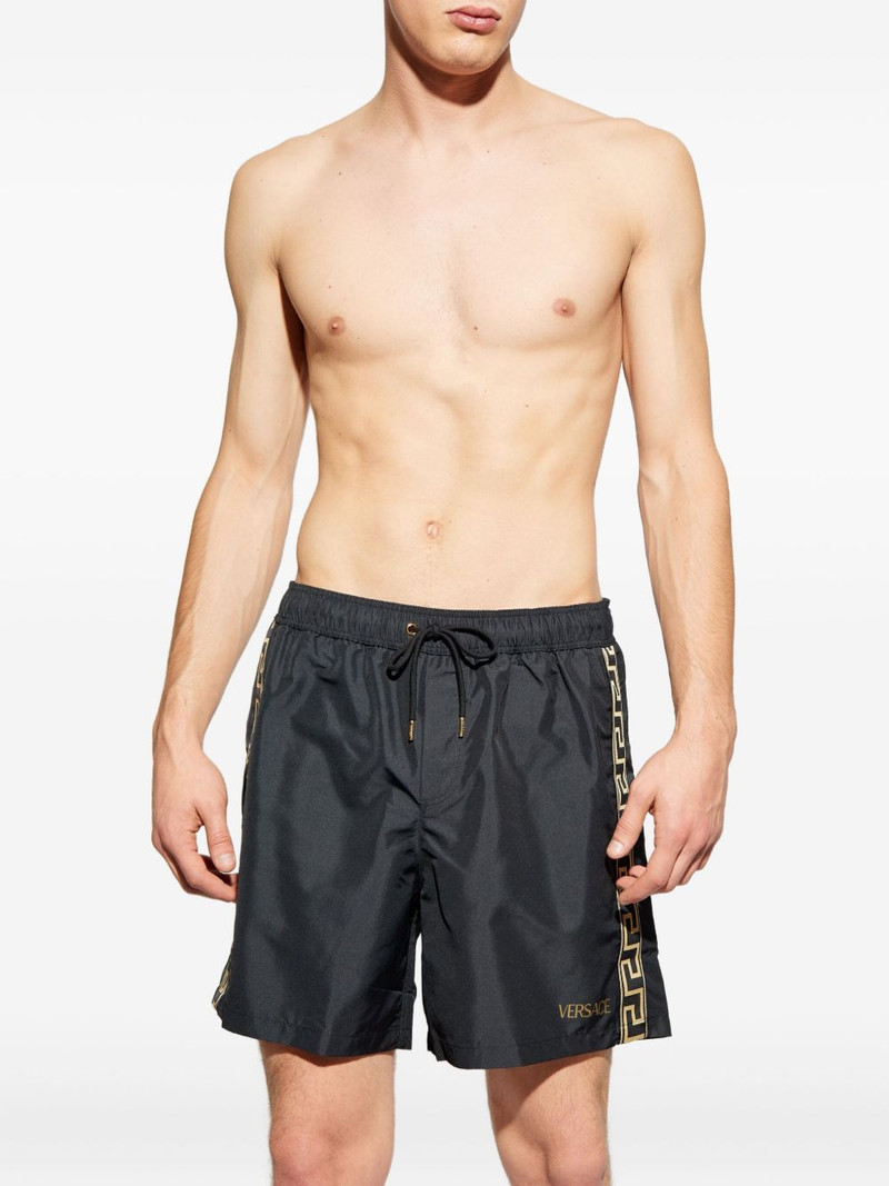 VERSACE drawstring logo-print swim shorts outlook