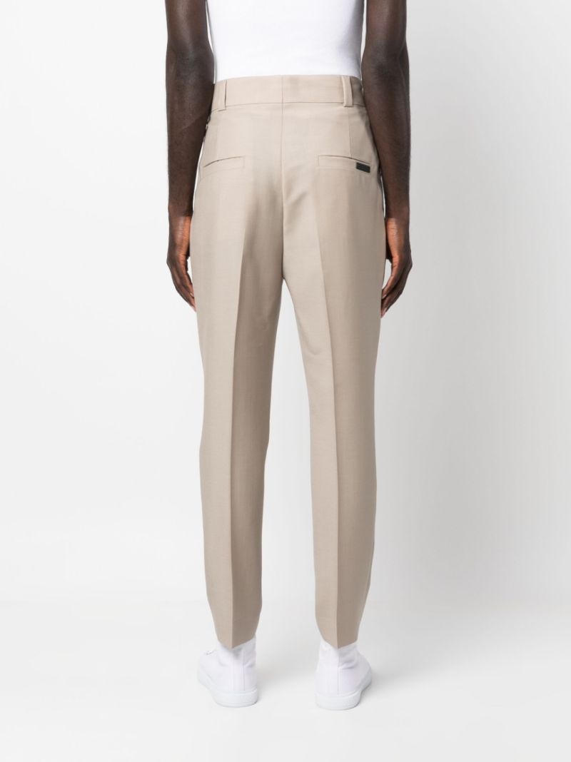 pleated tapered-leg trousers - 4