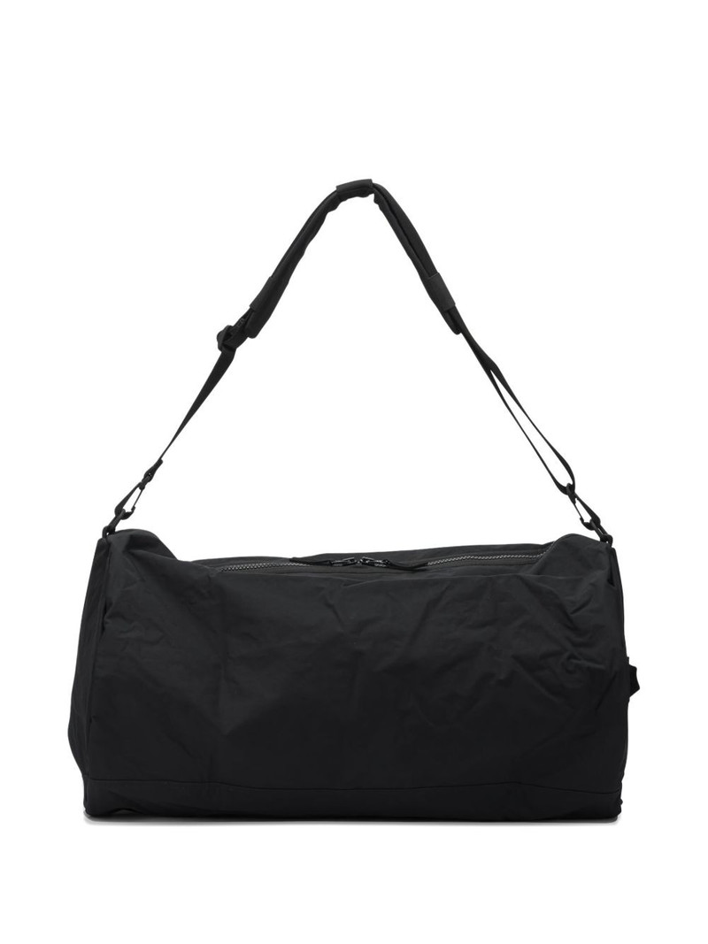 Stone Island logo-patch messenger bag outlook