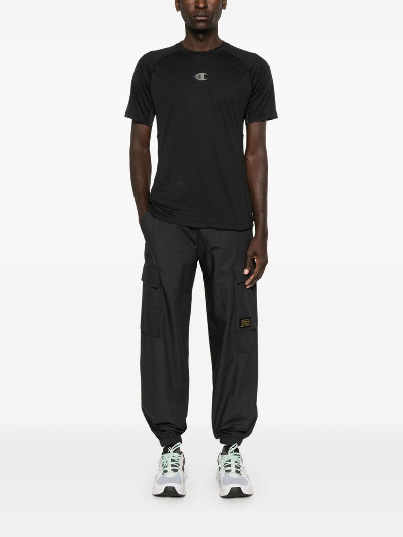 Champion logo-patch cargo trousers outlook