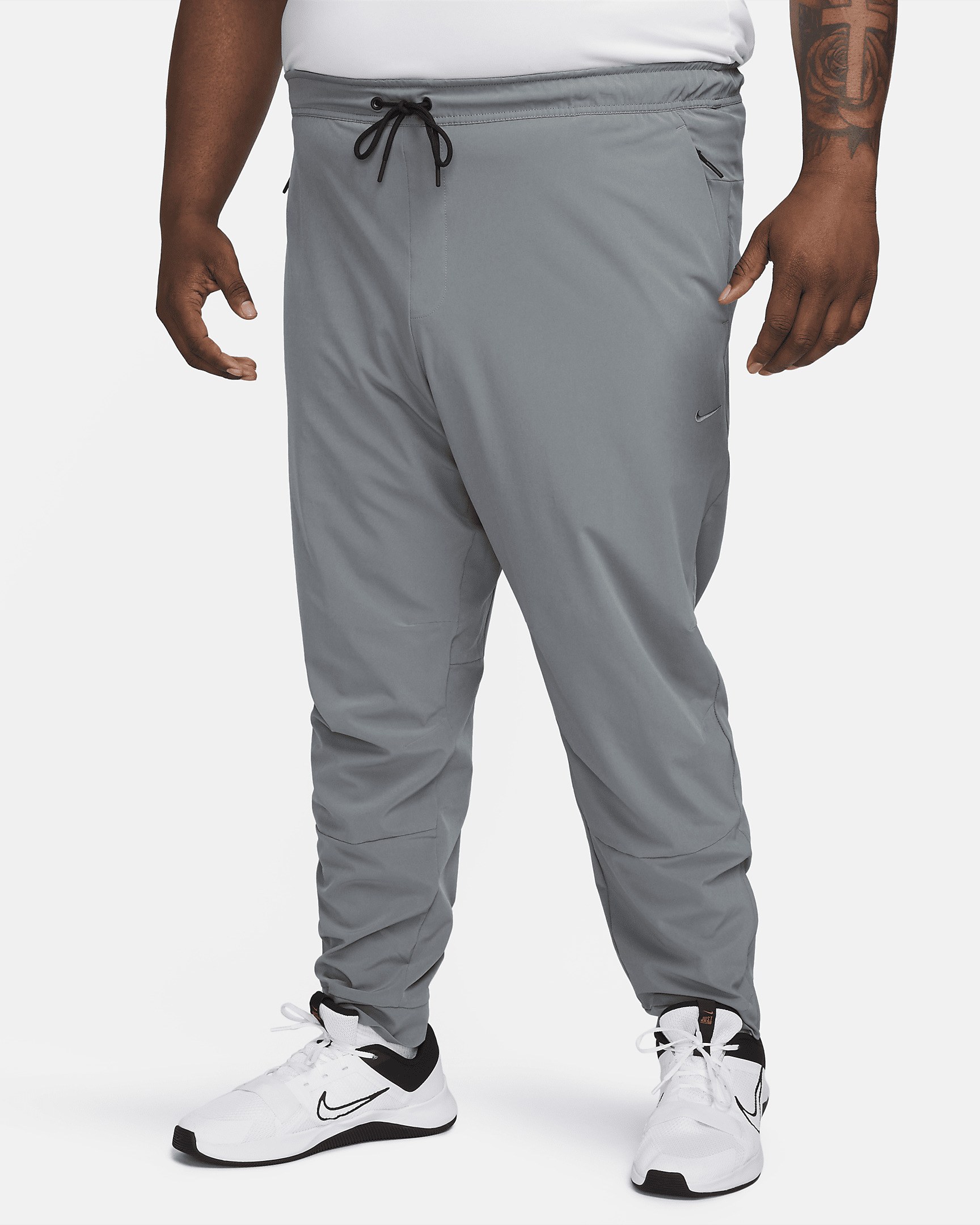 Nike Unlimited Men's Dri-FIT Zippered Cuff Versatile Pants - 7
