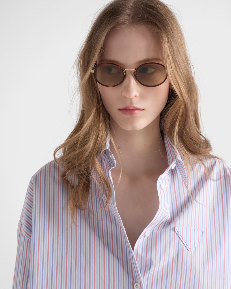 Prada Prada sunglasses with the iconic metal plaque outlook