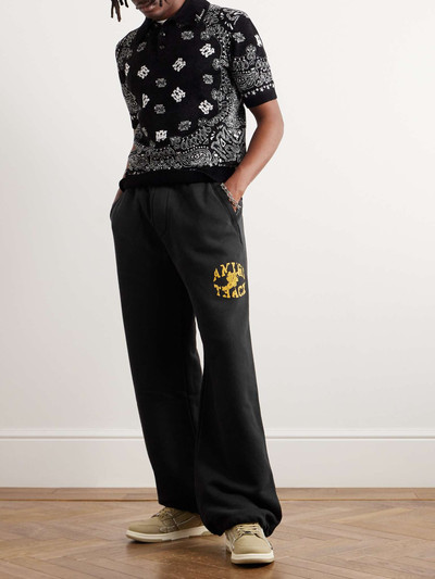 AMIRI Wide-Leg Logo-Flocked Cotton-Jersey Sweatpants outlook