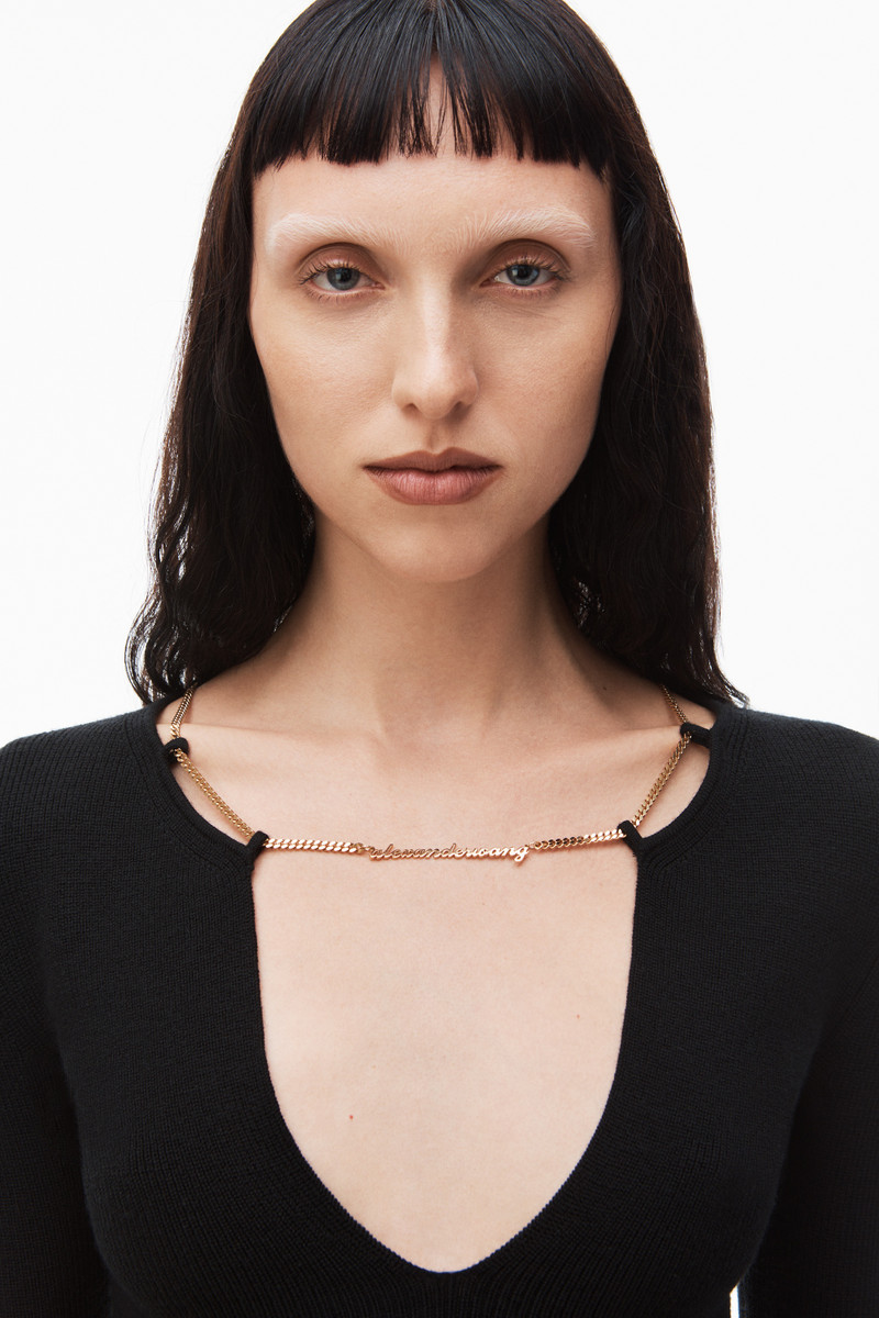 merino wool v neck pullover with logo nameplate 3