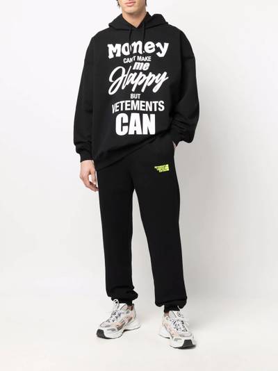 VETEMENTS logo-print slip-on track trousers outlook