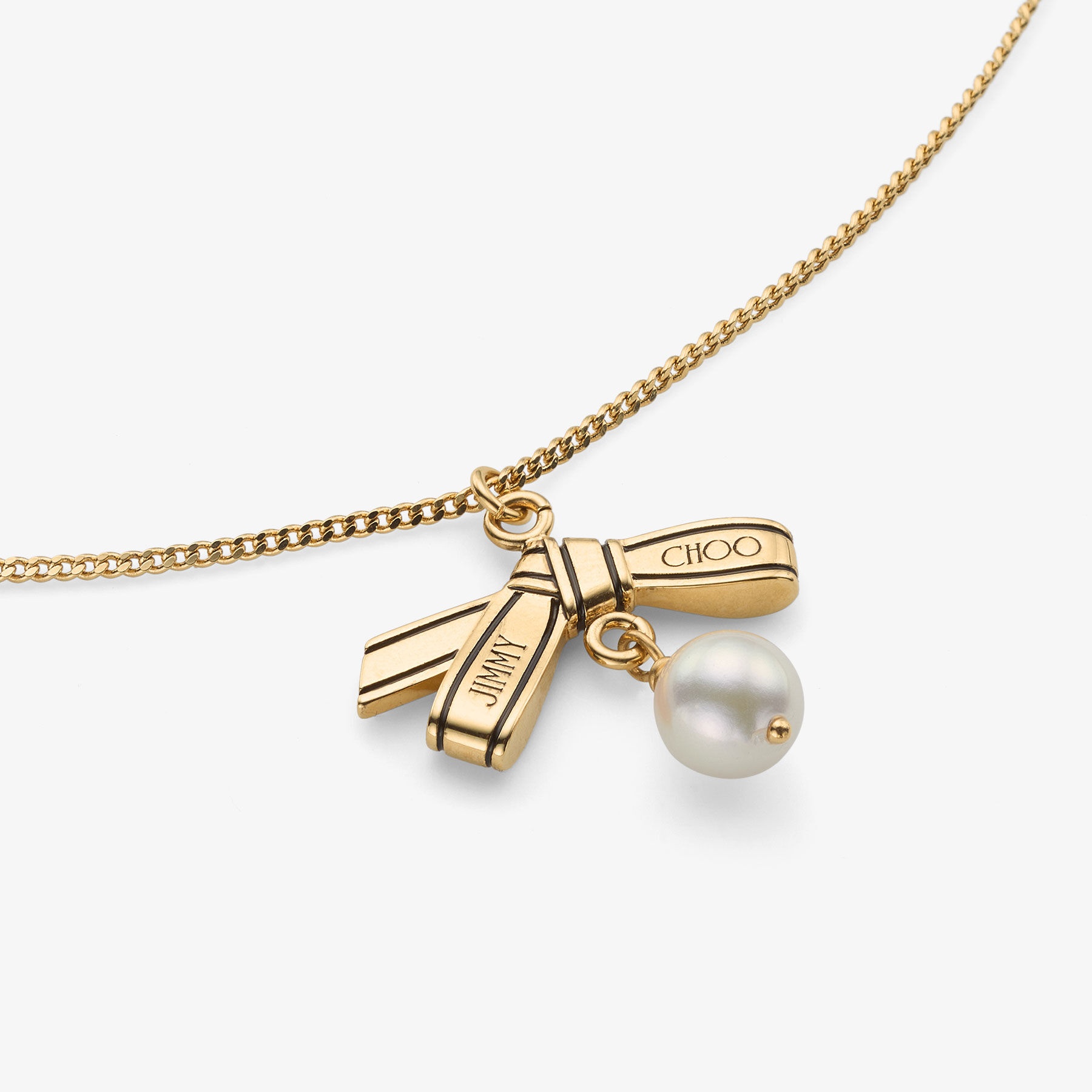 Ribbon Pendant Necklace
Gold Metal Pendant Necklace with Ribbon and Pearl - 2