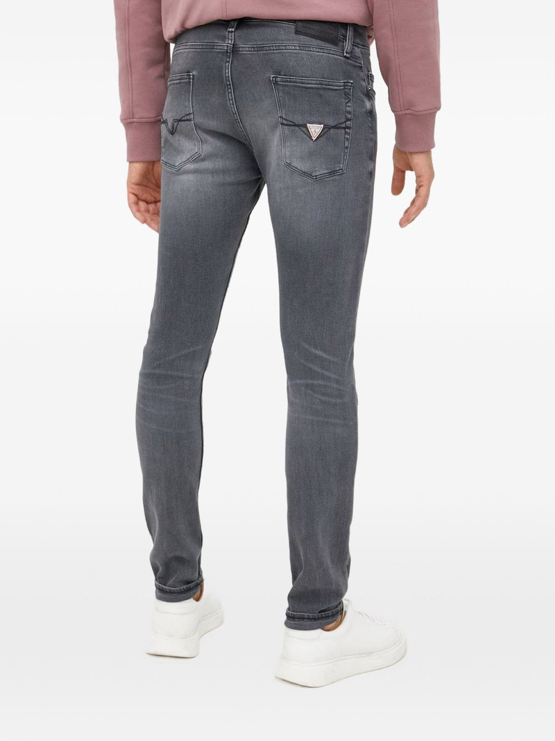Chris triangle-logo jeans 3