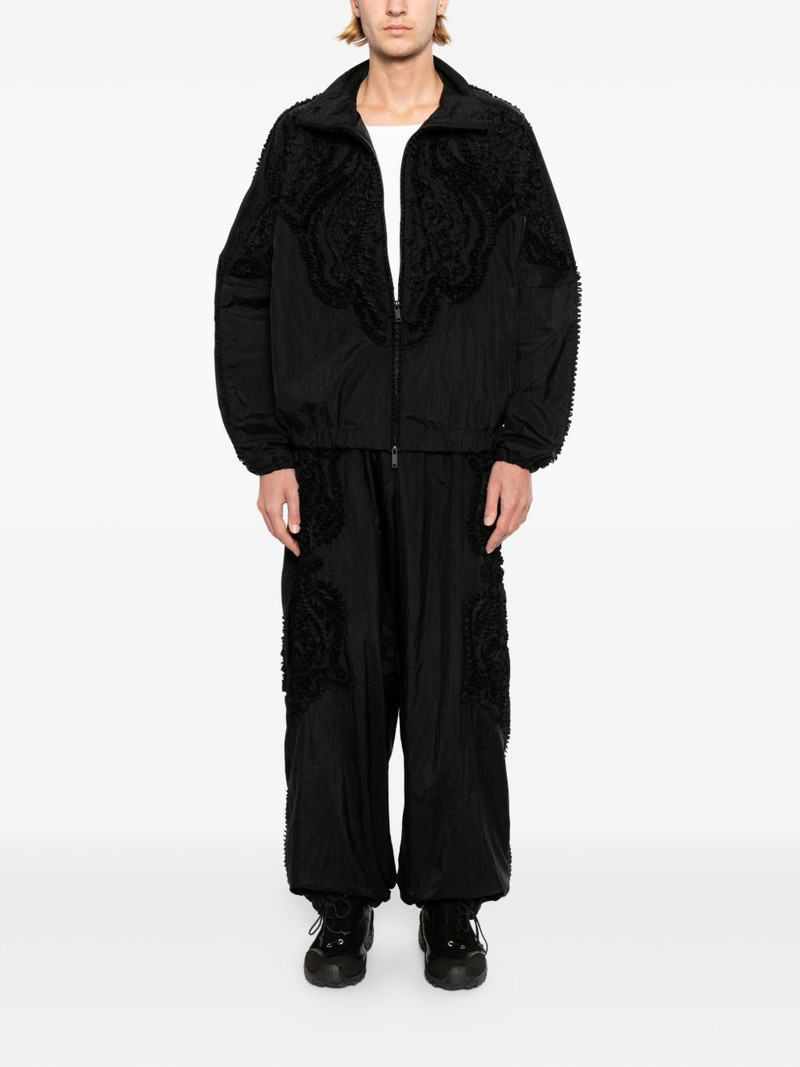 TAAKK ruffled trousers outlook