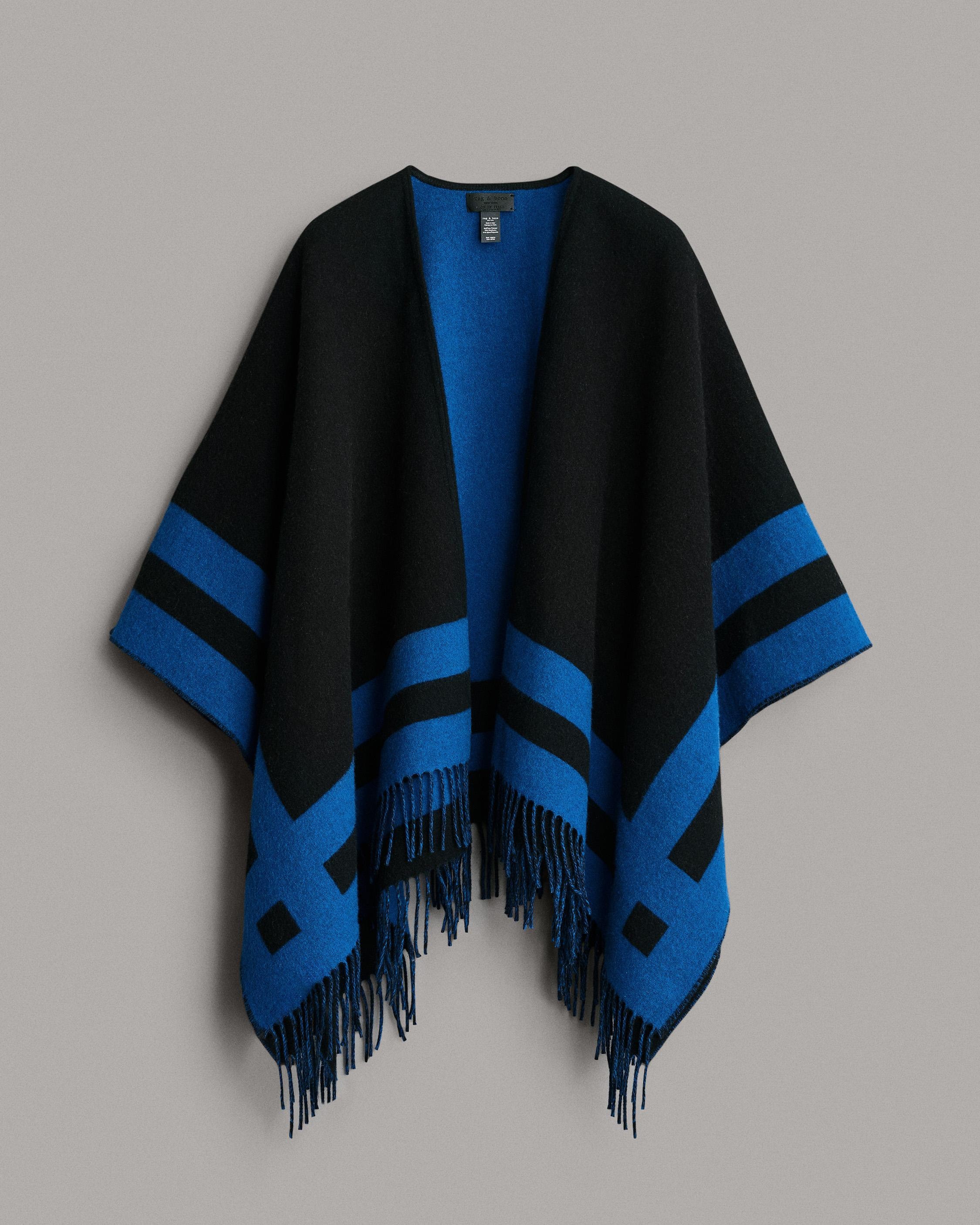 Highlands Wool Reversible Poncho
Midweight Poncho - 2