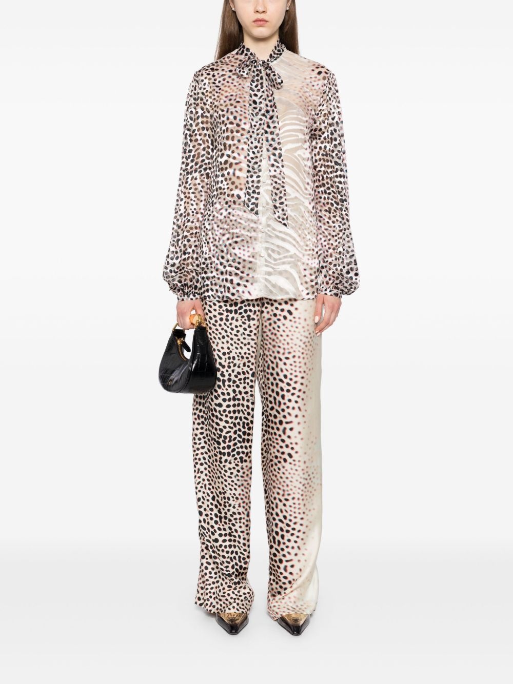 graphic-print straight trousers - 2