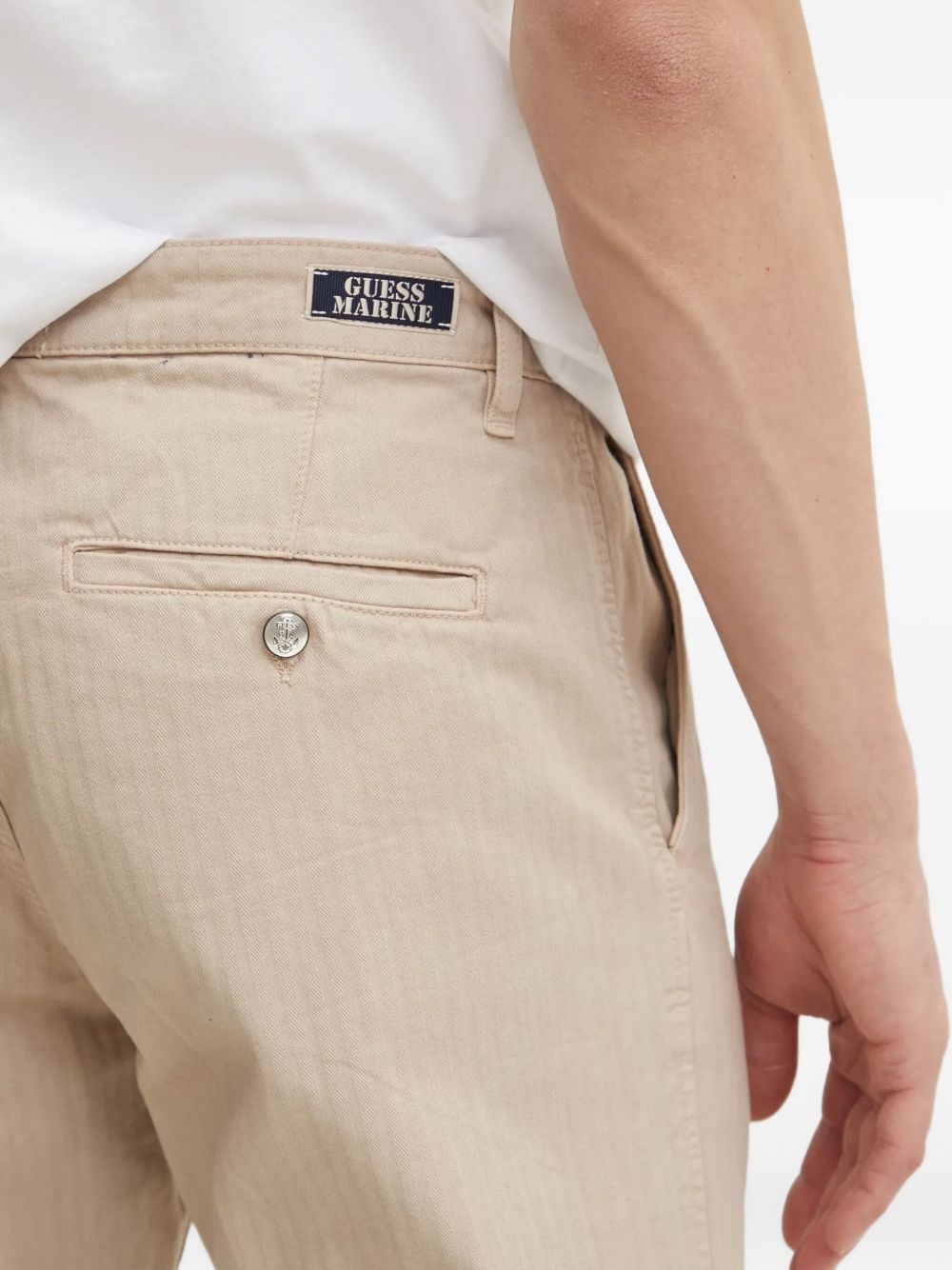 striped-pattern trousers - 4