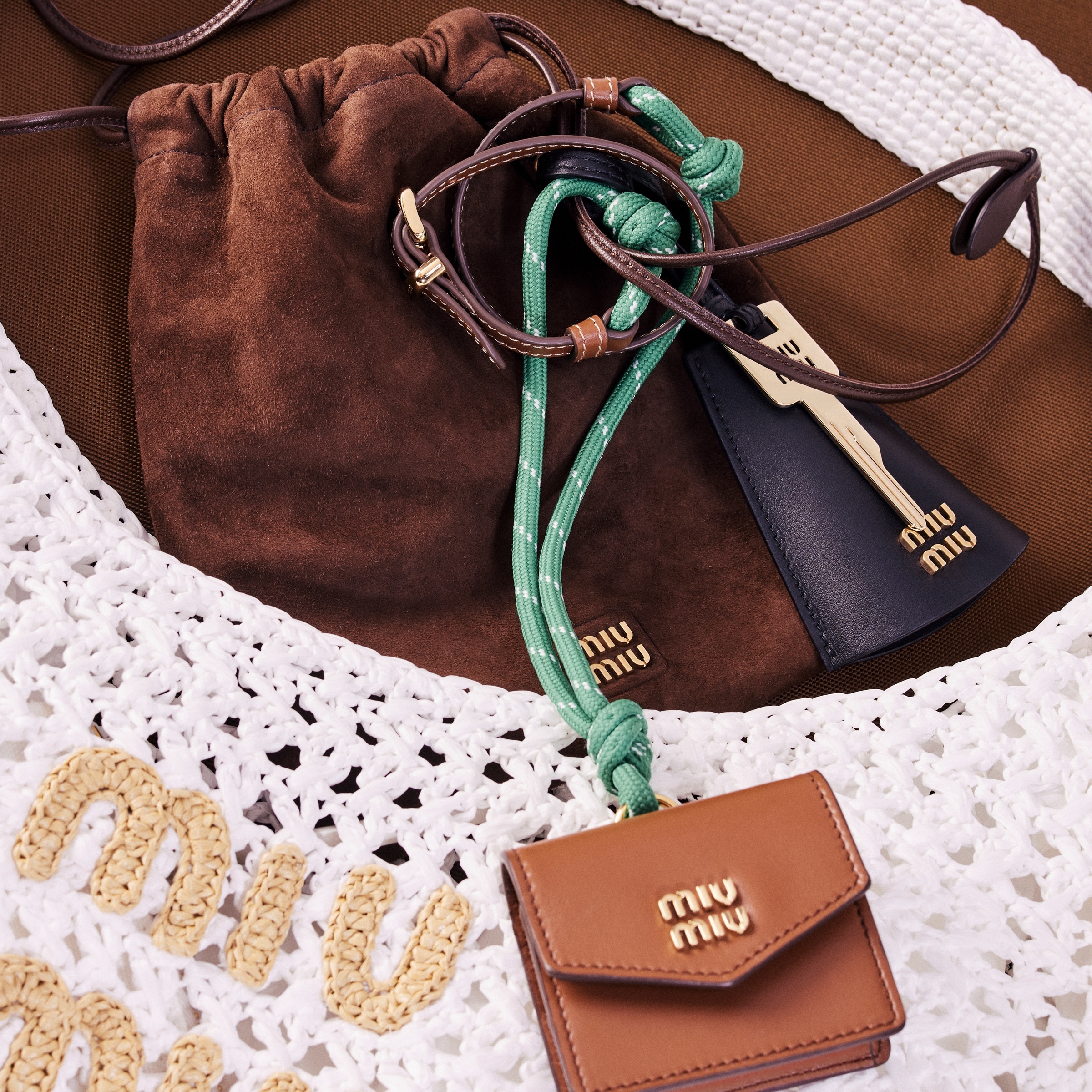 Leather, cord, and metal trick with mini-pouch - 2