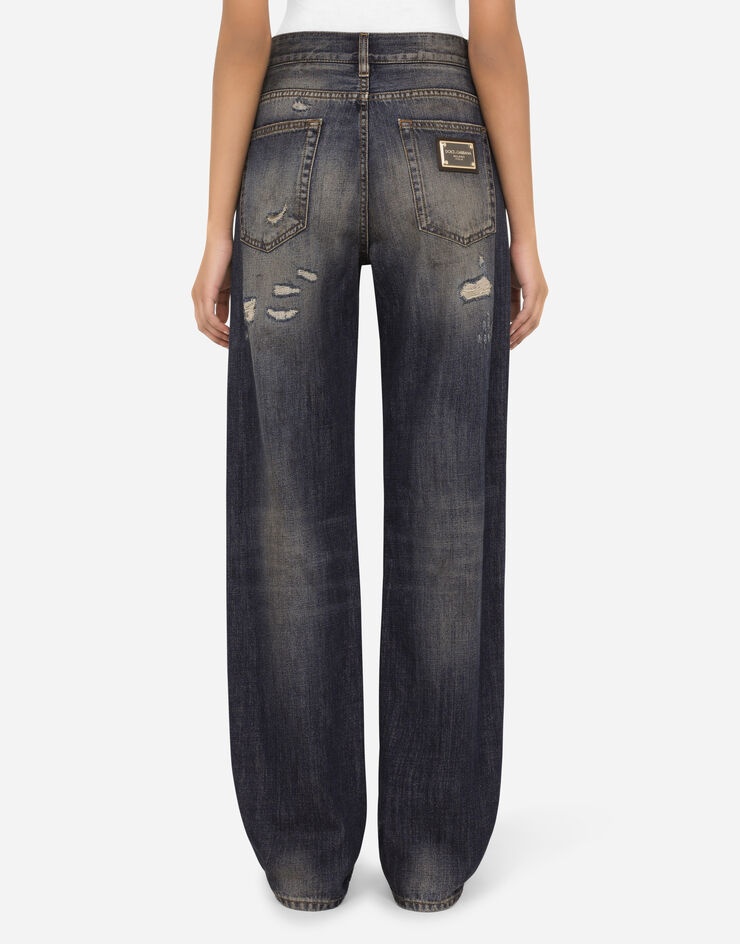 Flared jeans with ripped details - 3