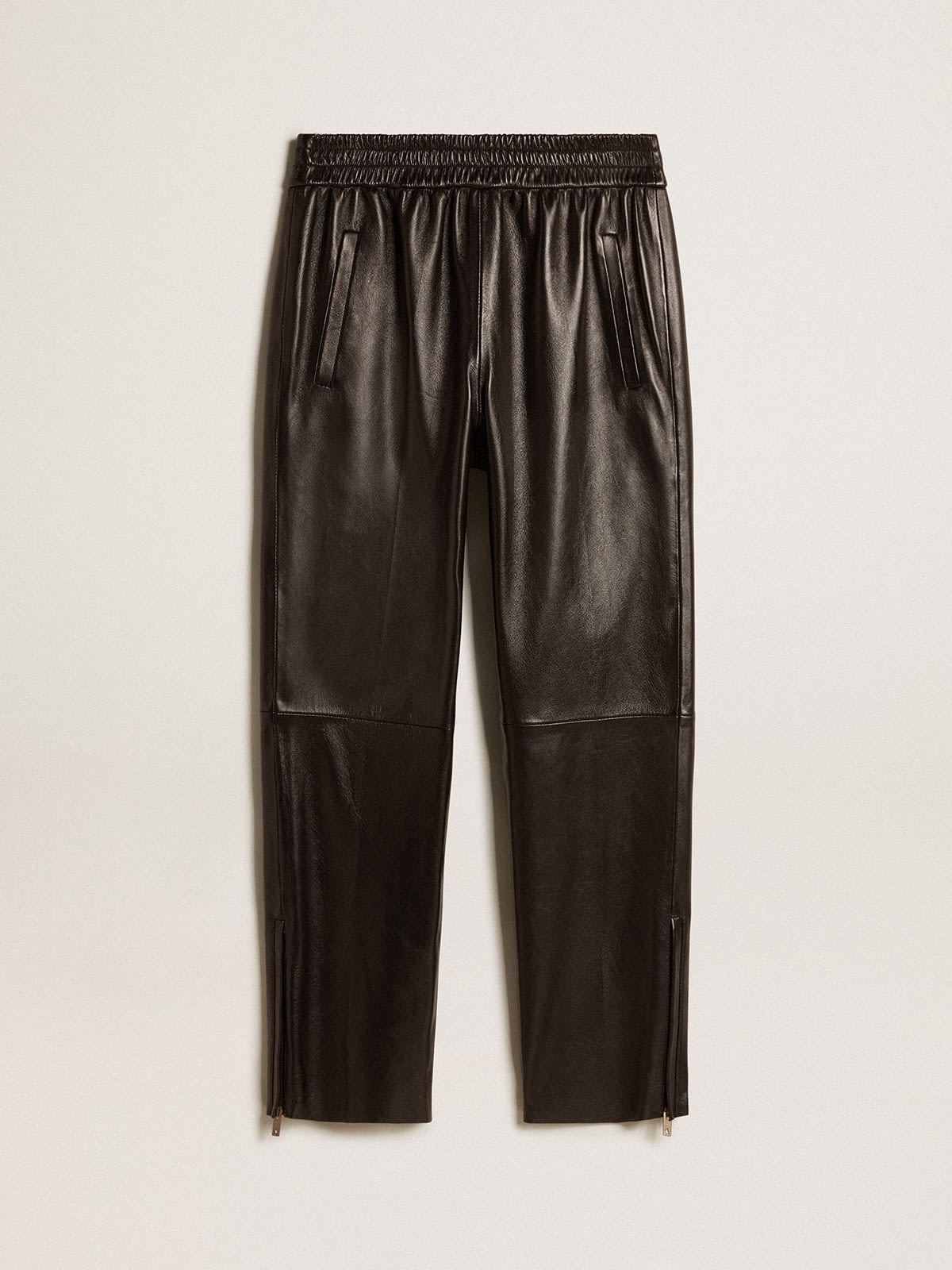Black joggers in nappa leather with zip at the base - 1