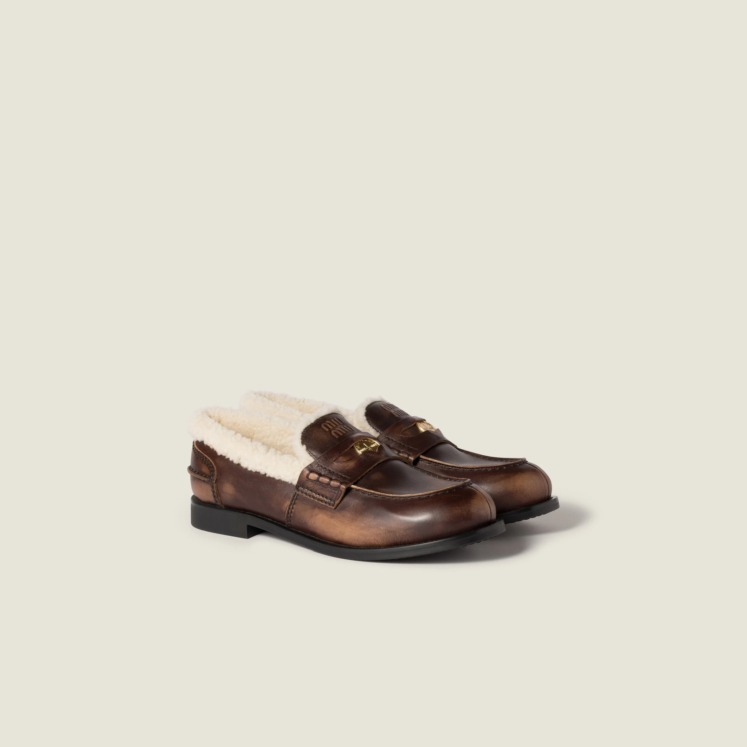 Bleached leather and shearling penny loafers - 1