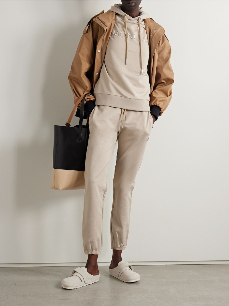 Moncler Appliquéd cotton-jersey tapered track pants Beige outlook