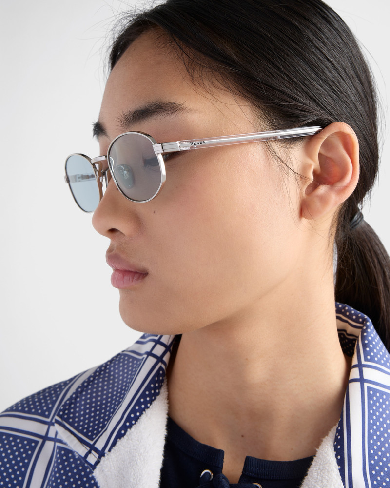 Prada Sunglasses with the iconic metal plaque outlook