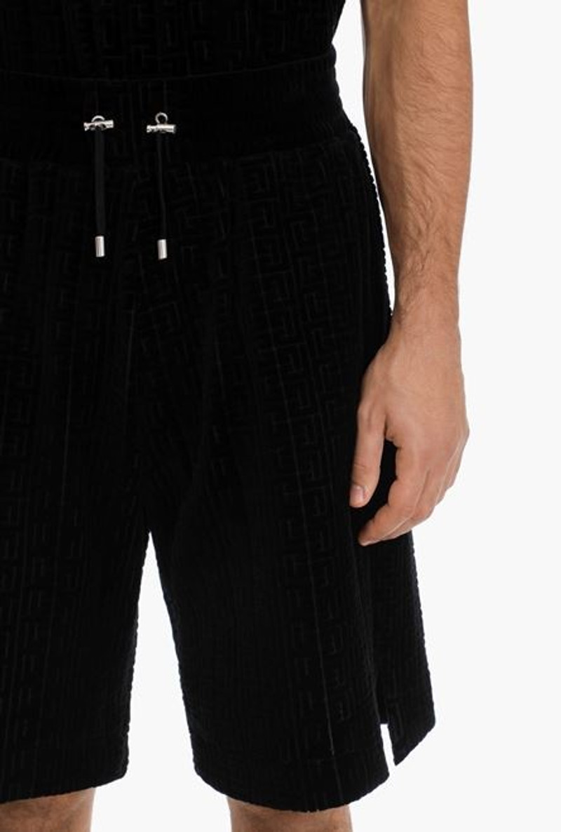 Black shorts with embossed velvet Balmain monogram 8