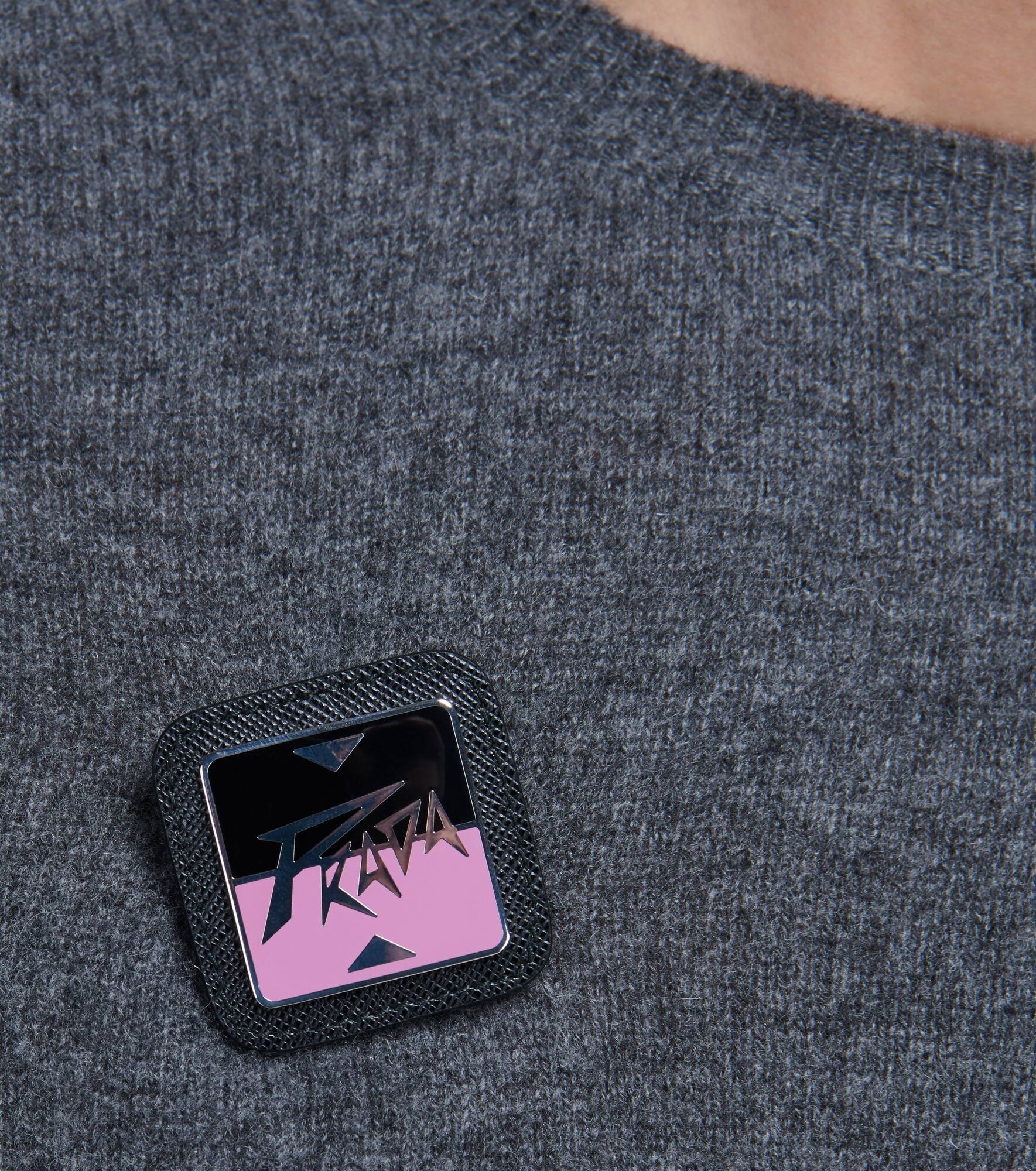 Leather-trimmed logo badge - 2
