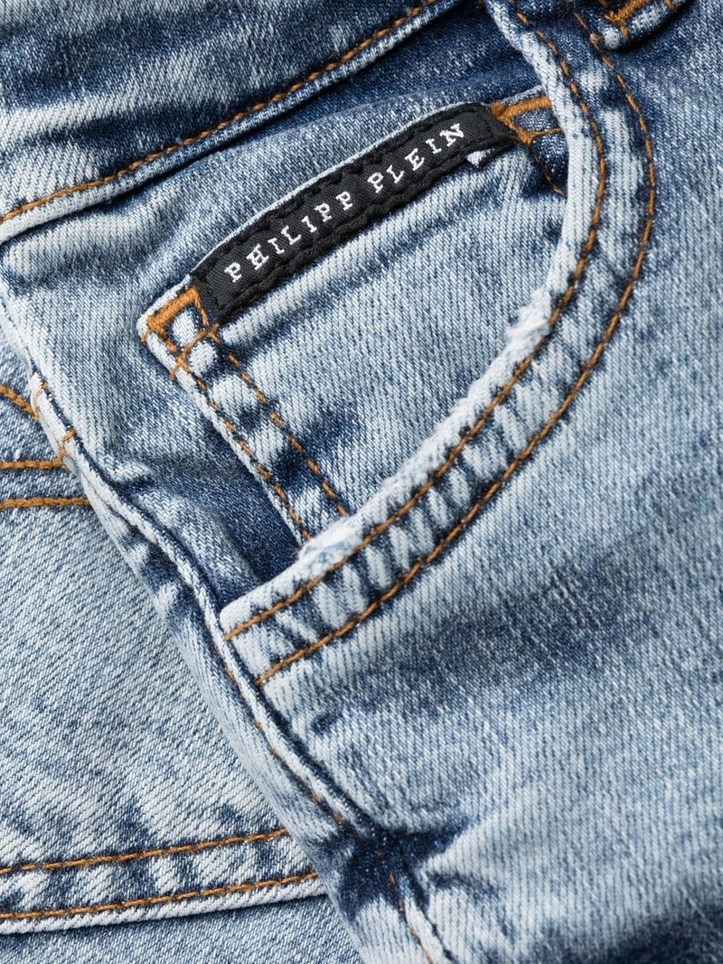 Skull embroidery skinny jeans 7
