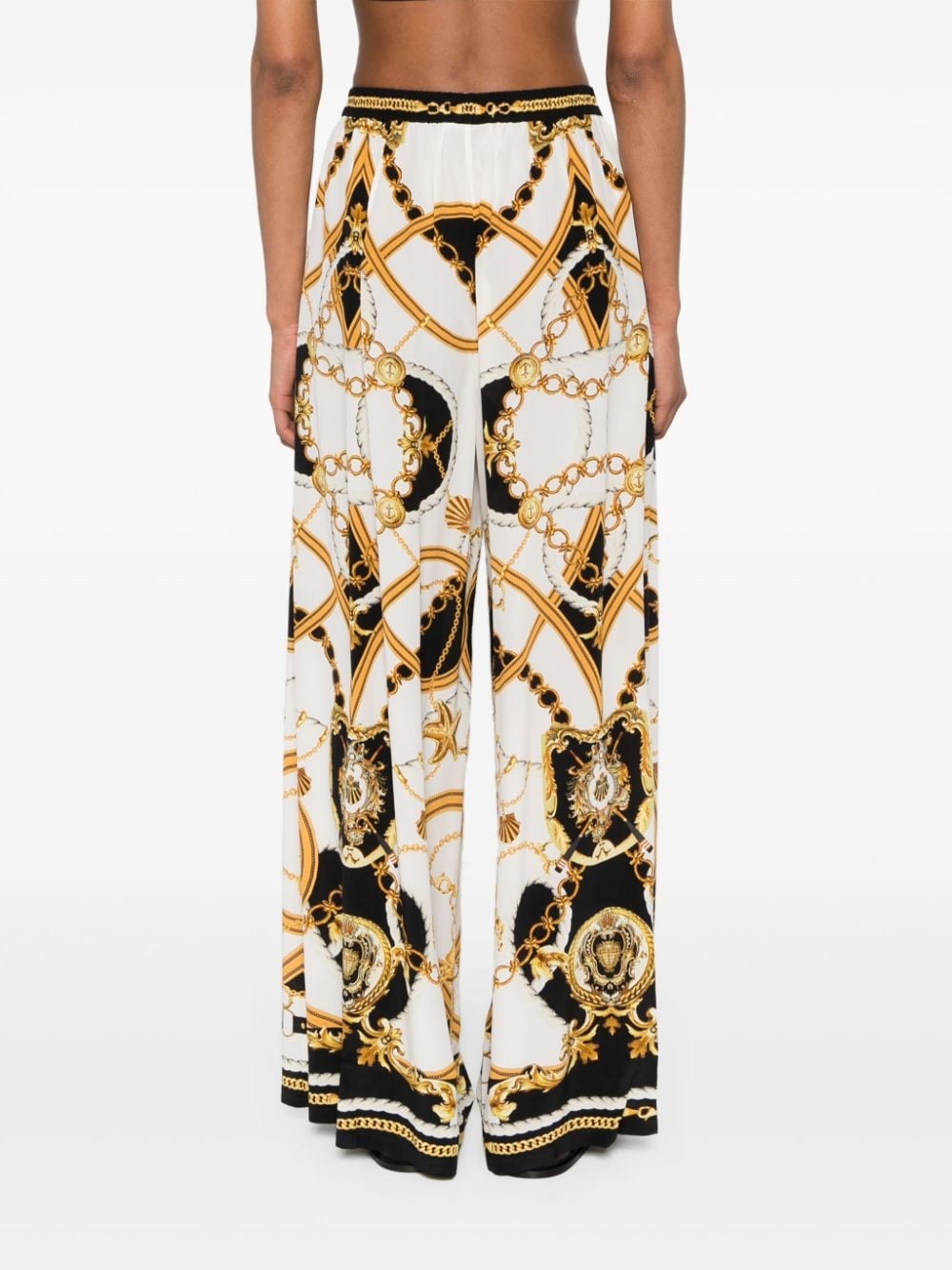 graphic-print silk flared trousers - 4