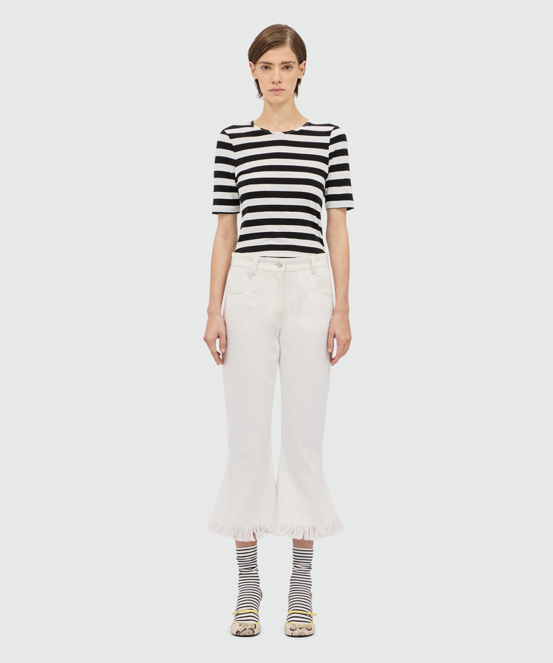 MSGM White frayed raw cotton flare Capri trousers. outlook