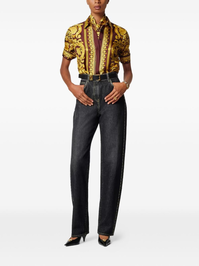 VERSACE studded denim trousers outlook