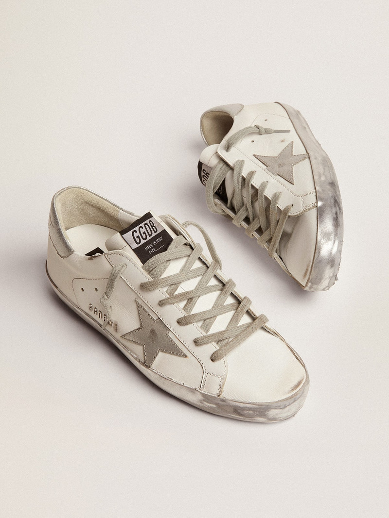 Golden Goose Super-Star sneakers with silver sparkle foxing and metal stud lettering outlook
