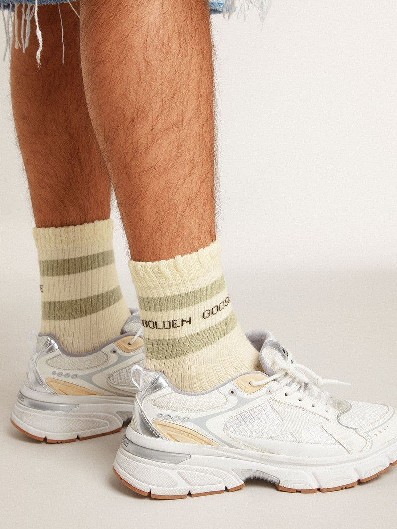 Golden Goose Worn-white socks with distressed details and sage-green stripes outlook