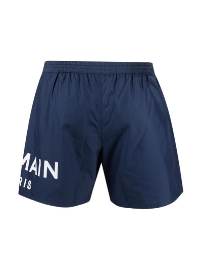 Balmain logo-print drawstring swim shorts outlook